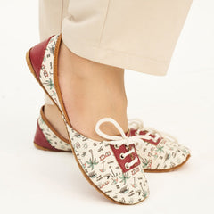 “Close-up of Paradise Doodles Lace Up Khussa shoes highlighting embroidery and leather quality”
