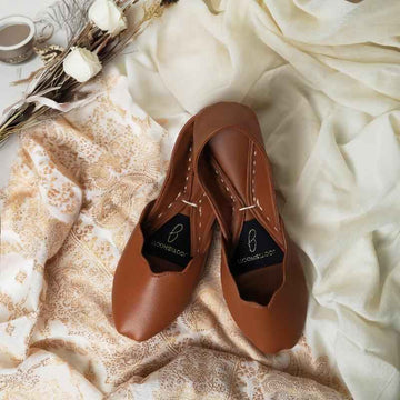 “Top view of PerfPastel Tan Khussa shoes for women, lightweight traditional footwear Pakistan”