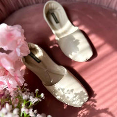 “Side view of Cream Nawabi Khussa shoes showing smooth leather and comfortable design for women”