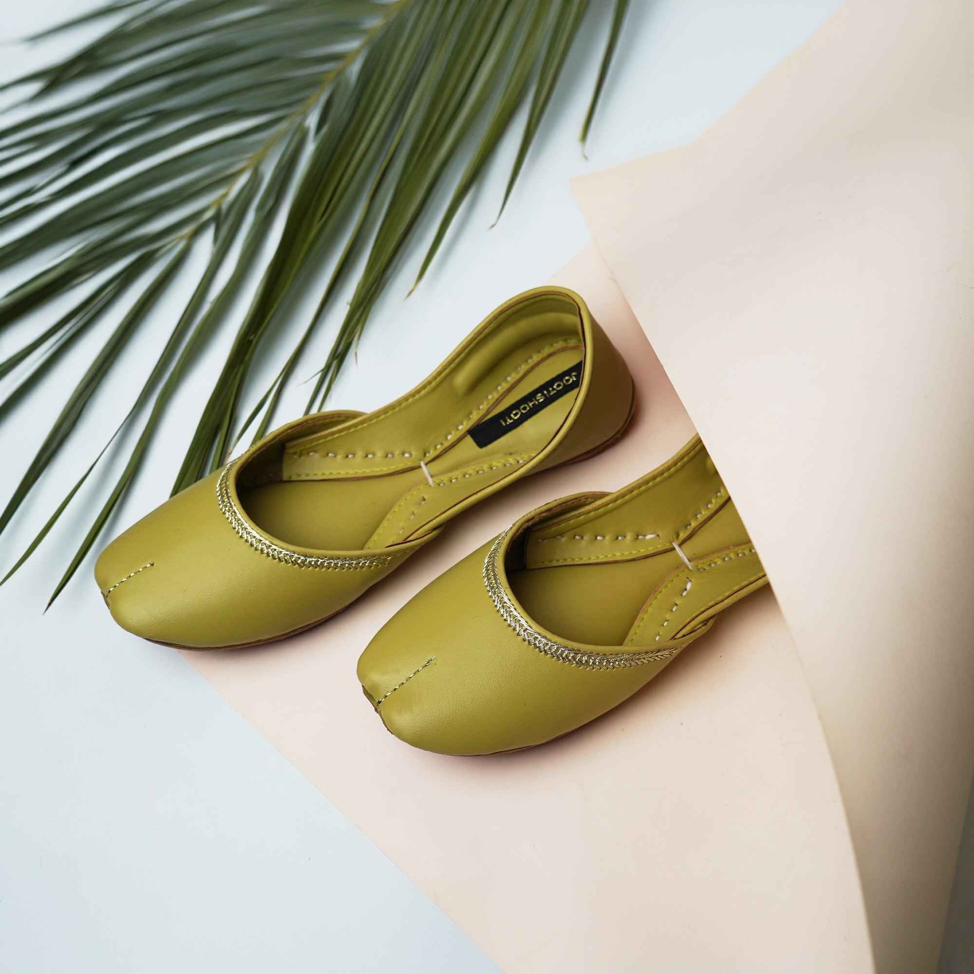“Close-up of Olive Green Zari Khussa shoes highlighting leather texture and subtle zari detailing”
