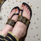 Golden and black jutti | designer shoes